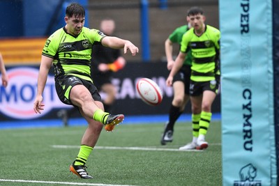 230225 - Scarlets U18s v Dragons U18s - Regional Age-Grade Championship finals - David Petrescu of Dragons U18s kicks the ball away from danger