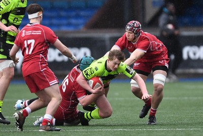 230225 - Scarlets U18s v Dragons U18s - Regional Age-Grade Championship finals - Joe Salter of Dragons U18s is challenged by Will Davies of Scarlets U18s