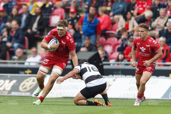 160923 - Scarlets v Barbarians - Phil Bennett Memorial Game - Harri O’Connor of Scarlets is tackled by Shunta Nakamura of Barbarians