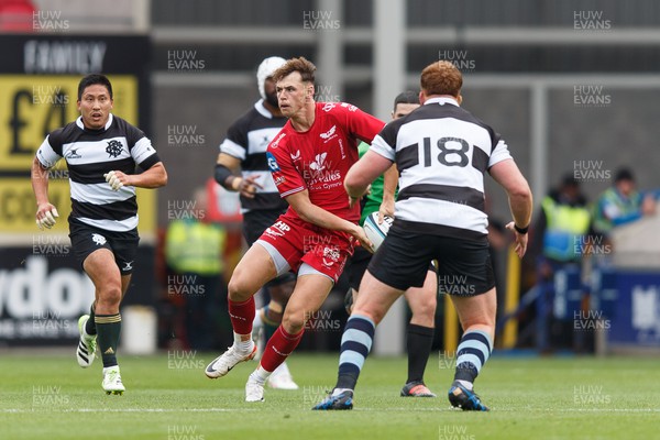 160923 - Scarlets v Barbarians - Phil Bennett Memorial Game - Tom Rogers of Scarlets on the attack