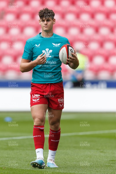 160923 - Scarlets v Barbarians - Phil Bennett Memorial Game - Eddie James of Scarlets warms up ahead of the match