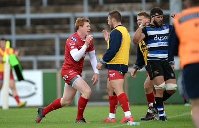 200816 - Scarlets v Bath - Preseason Friendly -Rhys Patchell of Scarlets celebrates his try with Billy McBryde