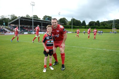 200816 - Scarlets v Bath - Preseason Friendly -Ken Owens of Scarlets leads out his side