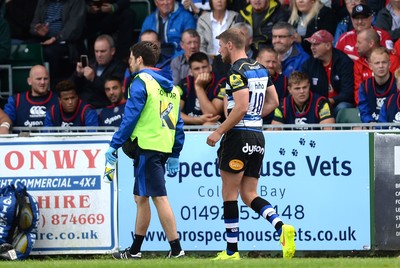 200816 - Scarlets v Bath - Preseason Friendly -Rhys Priestland of Bath leaves the field with an injury