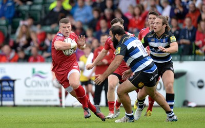 200816 - Scarlets v Bath - Preseason Friendly -Scott Williams of Scarlets loos for a way through