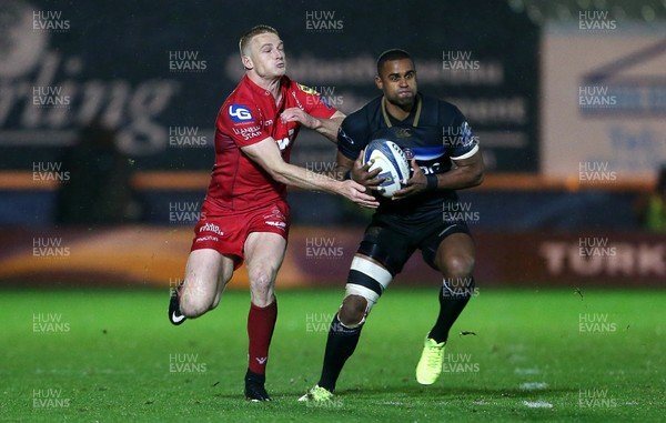 201017 - Scarlets v Bath - European Rugby Champions Cup - Aled Brew of Bath is challenged by Johnny McNicholl of Scarlets