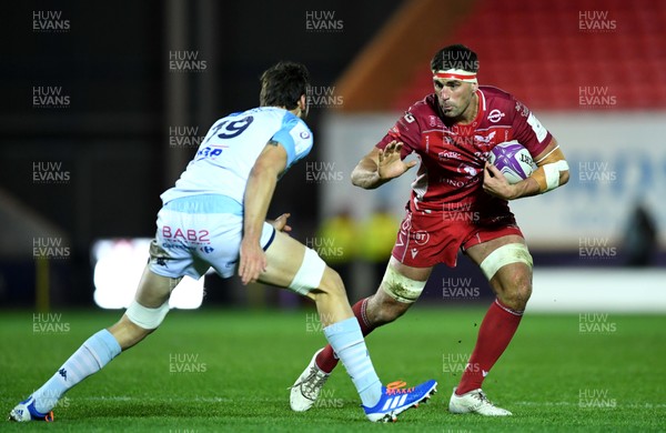 141219 - Scarlets v Bayonne - European Rugby Challenge Cup - Lewis Rawlins of Scarlets is tackled by Bastien Bergounioux of Bayonne