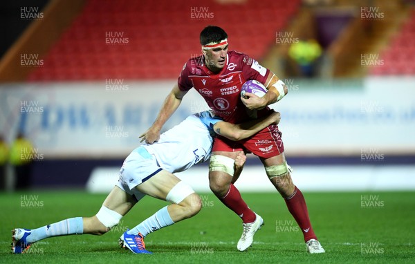 141219 - Scarlets v Bayonne - European Rugby Challenge Cup - Lewis Rawlins of Scarlets is tackled by Bastien Bergounioux of Bayonne