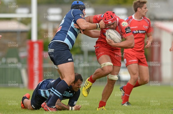 290815 Scarlets v Bedford Pre Season FriendlyJosh Macleod breaks a Bedford tackle