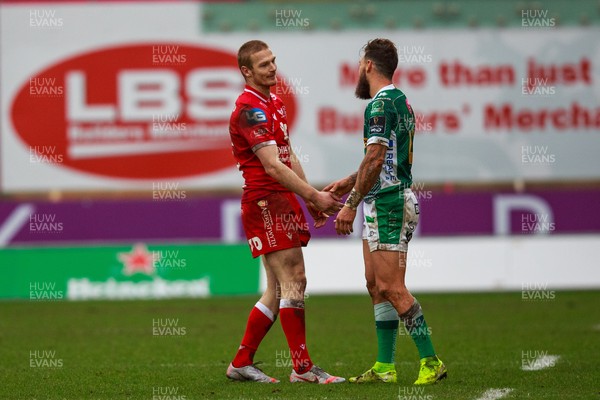 200221 - Scarlets v Benetton - Guinness PRO14 -   Johnny McNicholl of Scarlets and Benetton fullback Jayden Hayward at the end of the match