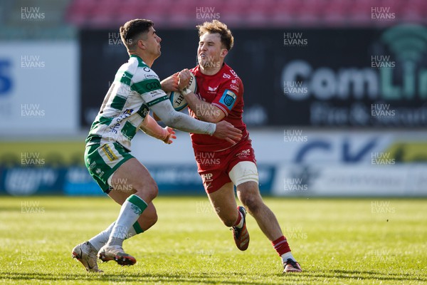 230324 - Scarlets v Benetton - United Rugby Championship - Ioan Lloyd of Scarlets is tackled by Ignacio Mendy of Benetton