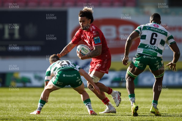 230324 - Scarlets v Benetton - United Rugby Championship - Vaea Fifita of Scarlets takes on Alessandro Garbisi of Benetton