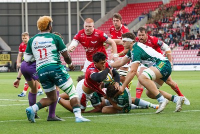101026 - Scarlets v Benetton Rugby - United Rugby Championship - Sam Lousi of Scarlets goes over for a try