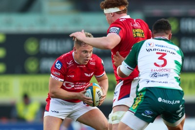 101026 - Scarlets v Benetton Rugby - United Rugby Championship - Sam Costelow of Scarlets looks for a gap