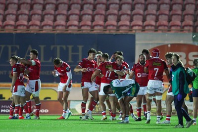 101026 - Scarlets v Benetton Rugby - United Rugby Championship - Scarlets players celebrate at the end of the match