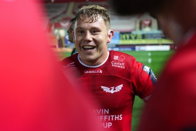 101026 - Scarlets v Benetton Rugby - United Rugby Championship - Sam Costelow of Scarlets all smiles at the end of the match