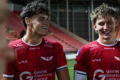 101026 - Scarlets v Benetton Rugby - United Rugby Championship - Eddie James and Ellis Mee of Scarlets at the end of the match