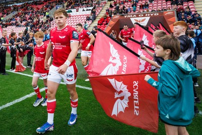 101026 - Scarlets v Benetton Rugby - United Rugby Championship - Macs Page of Scarlets runs on to the pitch before the match