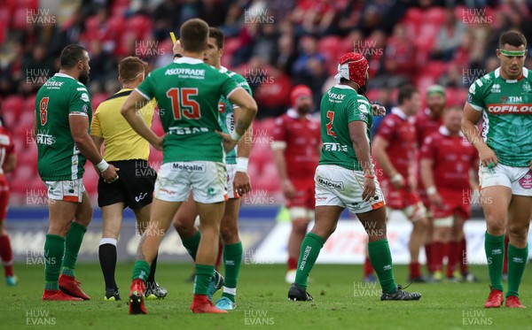 150918 - Scarlets v Benetton Rugby - Guinness PRO14 - Hame Faiva of Benetton is given a yellow card by Referee Lloyd Linton