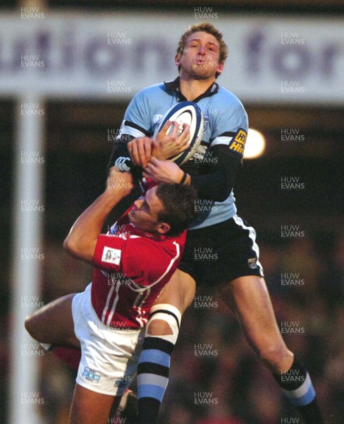 020106 - Llanelli Scarlets v Cardiff Blues - Celtic League -  Jamie Robinson takes high ball ahead of Lee Byrne