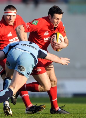 17.04.10 - Scarlets v Cardiff Blues - Magners League - Stephen Jones of Scarlets is tackled by Martyn Williams of Cardiff Blues. 