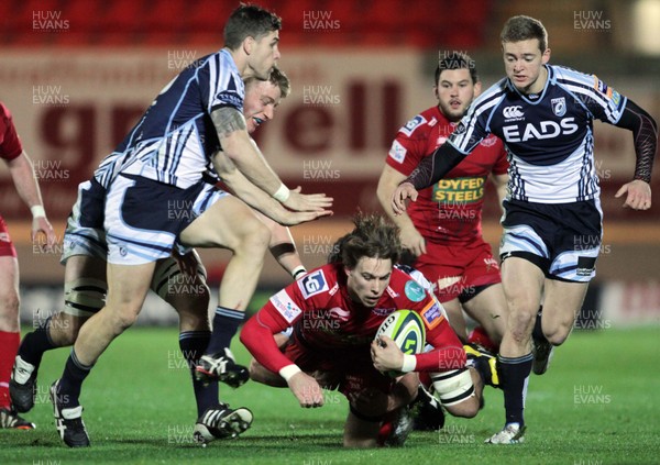 171112 Scarlets v Blues - LV= Cup - Scarlets' Liam Williams is tackled as he makes a break 