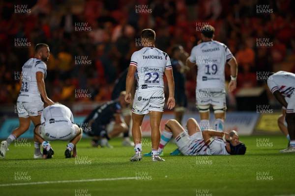 020922 - Scarlets v Bristol Bears - Preseason Friendly - Players show their exhaustion at the end of the match