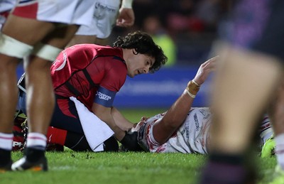 061225 - Scarlets v Bristol Bears - Investec European Champions Cup - Archer Holz of Scarlets is seen to by medical staff
