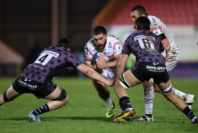 061225 - Scarlets v Bristol Bears - Investec European Champions Cup - Kemsley Mathias of Scarlets is tackled by Pedro Rubiolo of Bristol Bears 