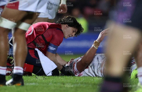 061225 - Scarlets v Bristol Bears - Investec European Champions Cup - Archer Holz of Scarlets is seen to by medical staff