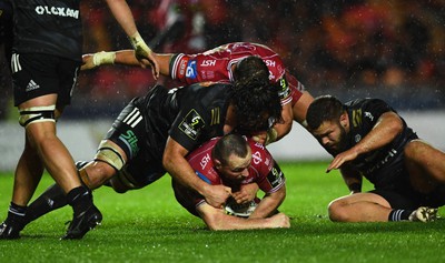 310323 - Scarlets v Brive - European Rugby Challenge Cup - Ken Owens of Scarlets is held