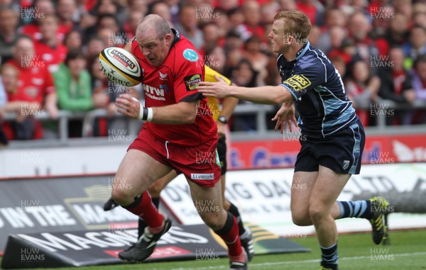 06.05.11 - Scarlets v Cardiff Blues - Magners League - Iestyn Thomas of Scarlets gets past Dan Fish of Cardiff Blues. 