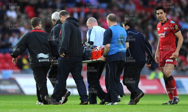 06.05.11 - Scarlets v Cardiff Blues - Magners League - Xavier Rush of Cardiff Blues is stretched off the field. 