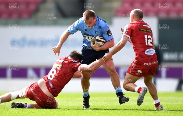 150521 - Scarlets v Cardiff Blues - Guinness PRO14 Rainbow Cup - Kristian Dacey of Cardiff Blues is tackled by James Ratti of Cardiff Blues