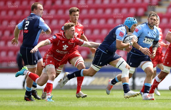 150521 - Scarlets v Cardiff Blues - Guinness PRO14 Rainbow Cup - Olly Robinson Cardiff Blues is stopped by Angus O'Brien of Scarlets