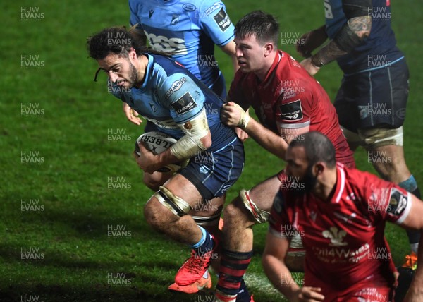 220121 - Scarlets v Cardiff Blues - Guinness PRO14 - Josh Navidi of Cardiff Blues is tackled by Ed Kennedy of Scarlets