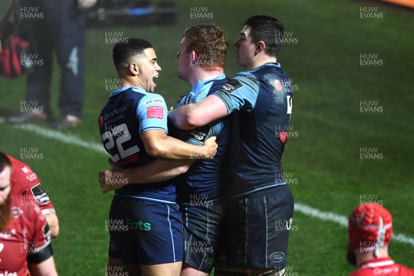 220121 - Scarlets v Cardiff Blues - Guinness PRO14 - Ben Thomas, Rhys Carre and Seb Davies of Cardiff blues celebrate win