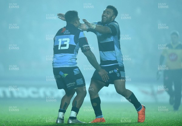 291218 - Scarlets v Cardiff Blues - Guinness PRO14 - Rey Lee-Lo (13) of Cardiff Blues celebrates scoring try with Willis Halaholo