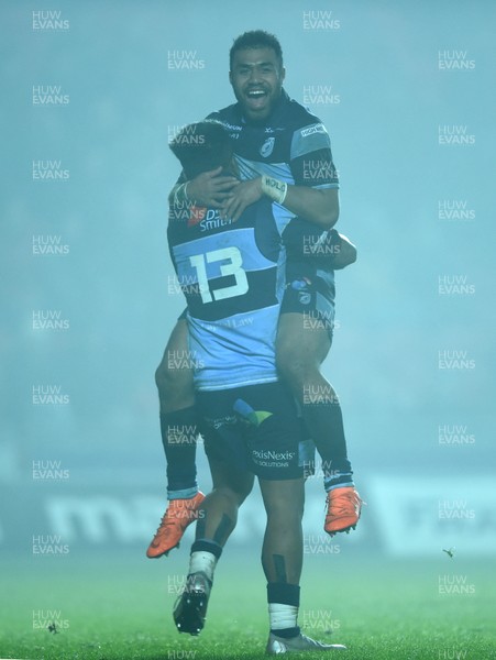 291218 - Scarlets v Cardiff Blues - Guinness PRO14 - Rey Lee-Lo (13) of Cardiff Blues celebrates scoring try with Willis Halaholo