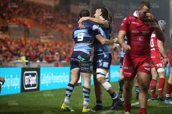 291218 - Scarlets v Cardiff Blues - Guinness PRO14 - Lloyd Williams celebrates with Josh Navidi of Cardiff Blues  after scoring a try
