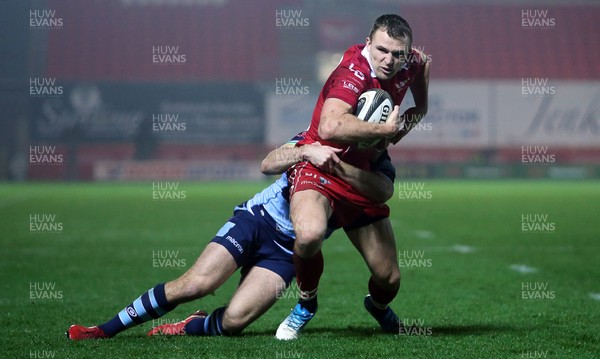 291218 - Scarlets v Cardiff Blues - Guinness PRO14 - Tom Prydie of Scarlets is tackled into touch by Garyn Smith of Cardiff Blues