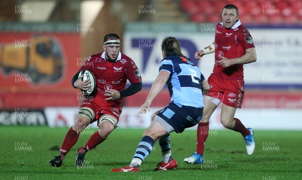 291218 - Scarlets v Cardiff Blues - Guinness PRO14 - Will Boyde of Scarlets is challenged by Kristian Dacey of Cardiff Blues