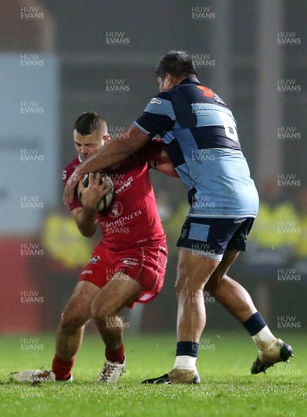 291218 - Scarlets v Cardiff Blues - Guinness PRO14 - Paul Asquith of Scarlets is crushed by a dominate Nick Williams of Cardiff Blues