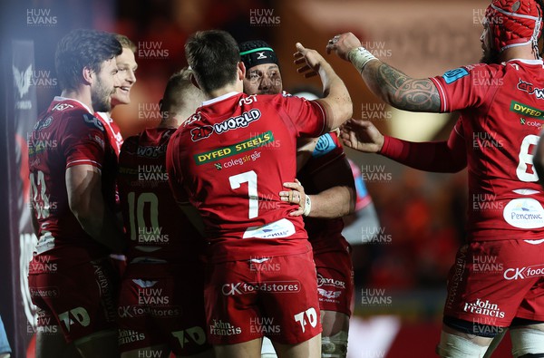 020422 - Scarlets v Cardiff Rugby - United Rugby Championship - Sione Kalamafoni of Scarlets celebrates scoring a try with team mates