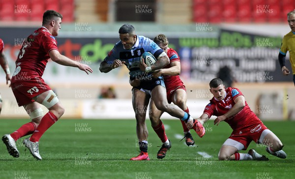 020422 - Scarlets v Cardiff Rugby - United Rugby Championship - Rey Lee-Lo of Cardiff is tackled by Sam Costelow of Scarlets