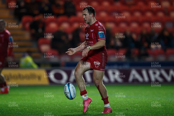 041123 - Scarlets v Cardiff Rugby - United Rugby Championship - Ioan Lloyd of Scarlets kicks the ball off the pitch to end the match