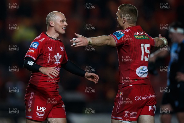 041123 - Scarlets v Cardiff Rugby - United Rugby Championship - Ioan Nicholas and Johnny McNicholl of Scarlets celebrate at the end of the match