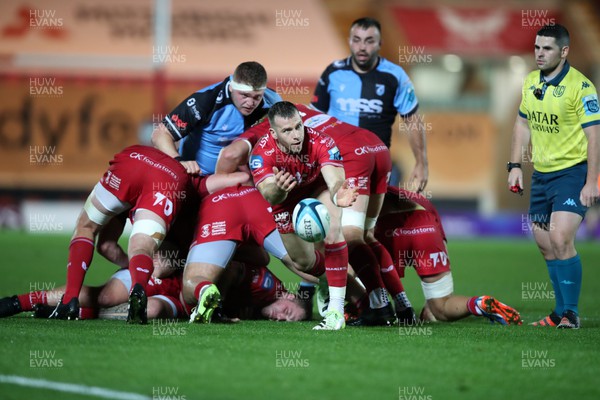041123 - Scarlets v Cardiff Rugby - United Rugby Championship - Gareth Davies of Scarlets clears 