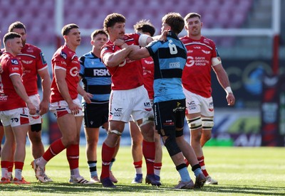 180426 - Scarlets v Cardiff Rugby - United Rugby Championship - Tensions boil over between Fletcher Anderson of Scarlets and Alex Mann of Cardiff 