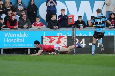 180426 - Scarlets v Cardiff Rugby - United Rugby Championship - Tom Rogers of Scarlets crosses without the ball